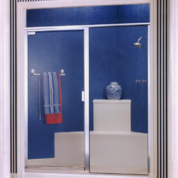 glass shower enclosure with blue tile