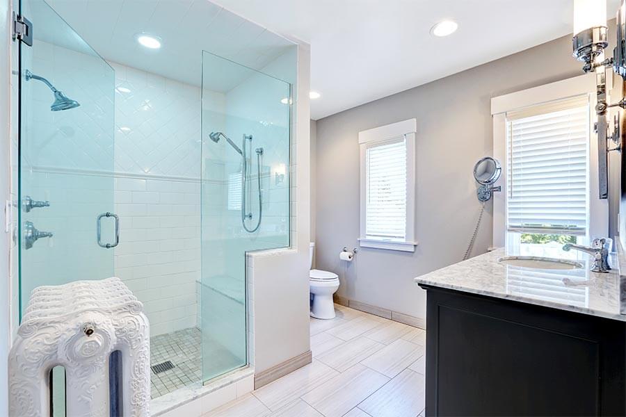 Sliding Frameless Shower Door frameless sliding glass door in all white bathroom in san jose