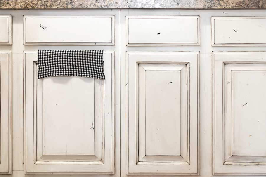 distressed white wood bathroom cabinets