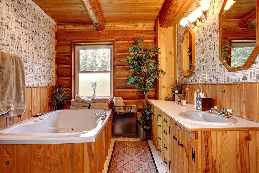 all wood bathroom with rustic hardware