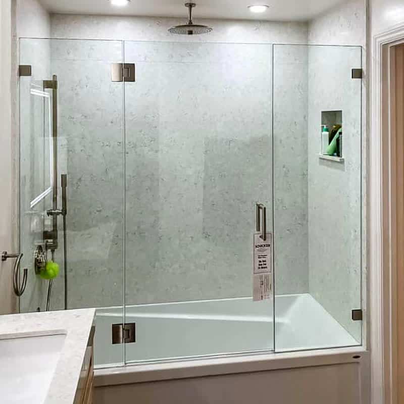 bathtub shower with hinged glass door