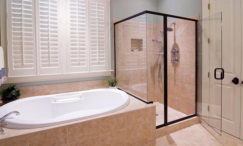 framed corner shower enclosure with hinged door