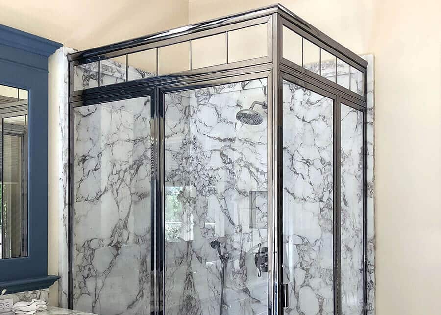 dark matte finish brass framed shower enclosure