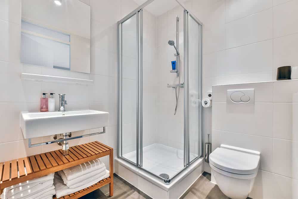 square corner glass shower door for smaller luxury bathroom